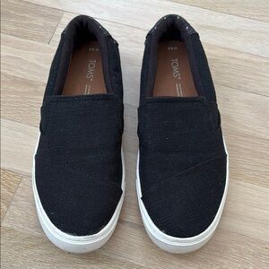 TOMS Women’s Black Canvas Slip-Ons